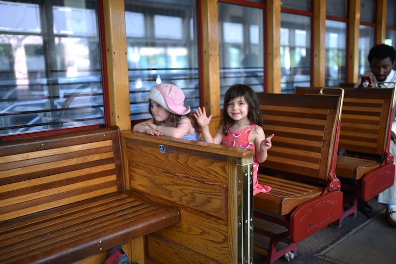 Kids ride a trolly in Tampa Bay